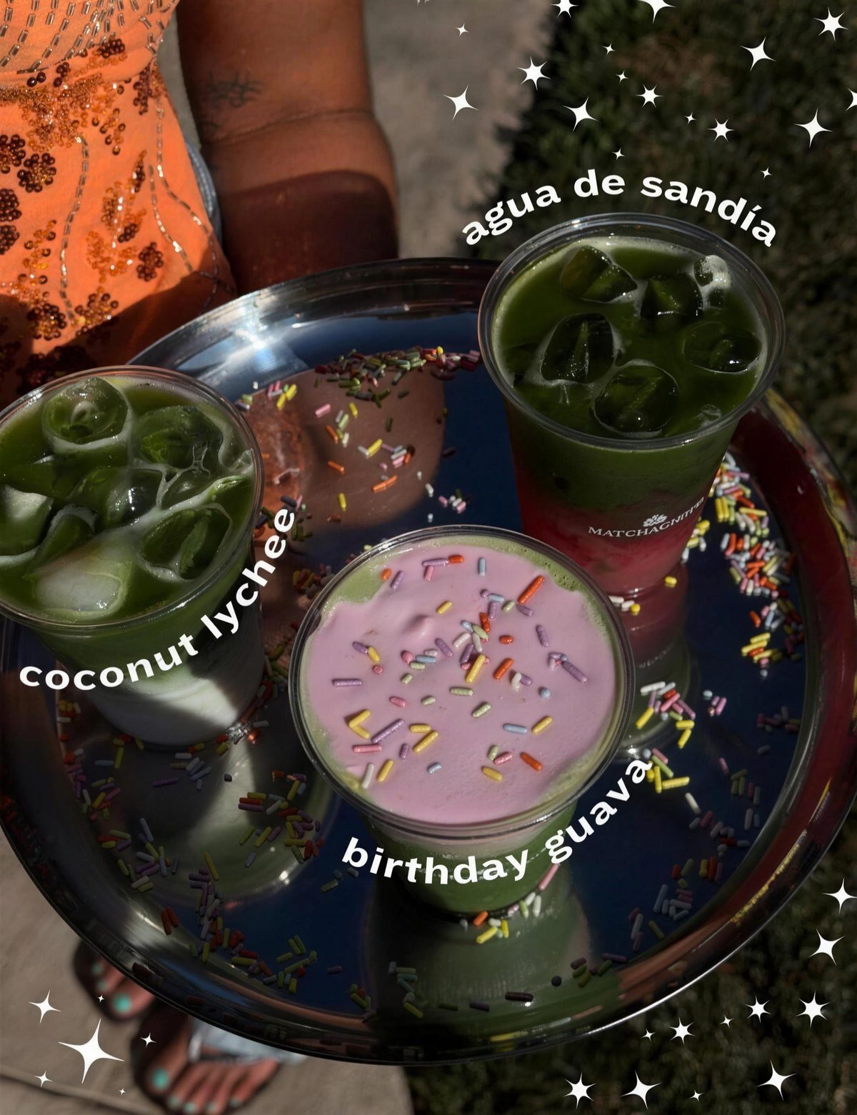 Tray of August specials: coconut lychee, agua de sandía, birthday guava
